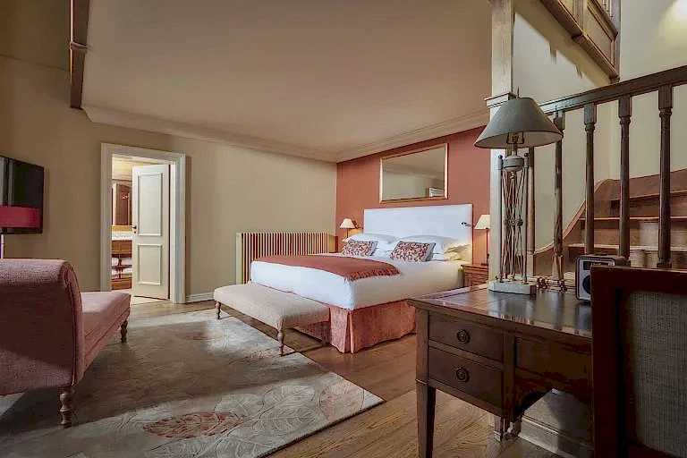 Deluxe Suit bedroom at country manor hotel